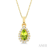 5x3 MM Pear Shape Peridot and 1/20 Ctw Single Cut Diamond Halo Semi-Precious Pendant with Chain in 14K Yellow Gold