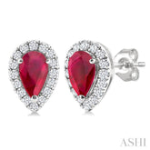 5x3 MM Pear Shape Ruby and 1/8 Ctw Round Cut Diamond Halo Precious Stud Earrings in 10K White Gold