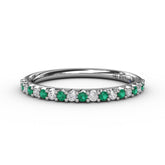 Delicate Emerald Shared Prong Anniversary Band