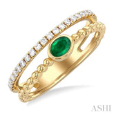 4x3 MM Oval Shape Emerald and 1/5 Ctw Single Cut Diamonds Precious Fashion Split Twin Ring in 10K Yellow Gold