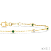 1.8 MM Emerald and 1/10 Ctw Bezel Set Round Cut Diamond Precious Gemstone Station Bracelet in 14K Yellow Gold
