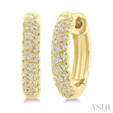1/5 Ctw Petite Swirl Pattern Round Cut Diamond Fashion Huggies in 10K Yellow Gold