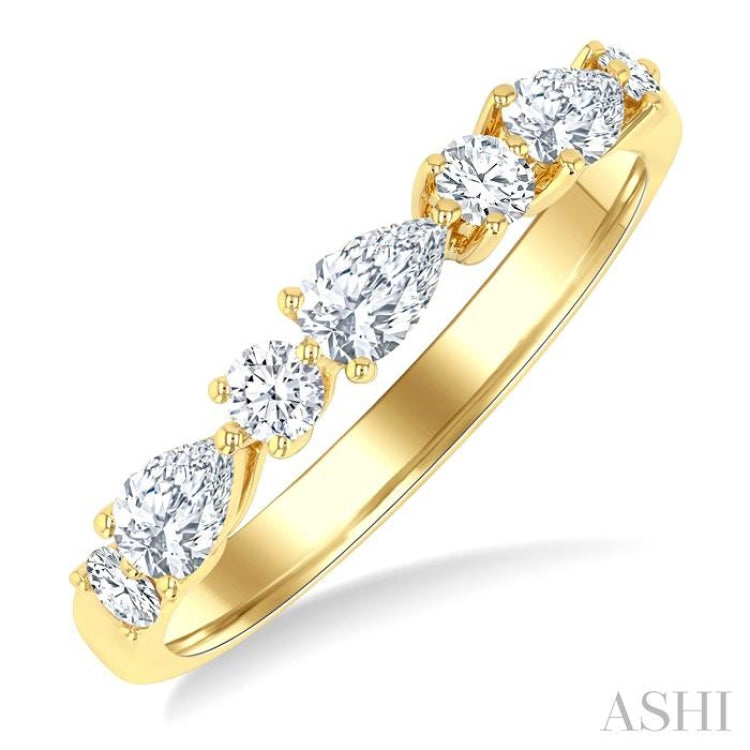 5/8 Ctw Pear and Round Cut Diamond Fashion Band in 14K Yellow Gold