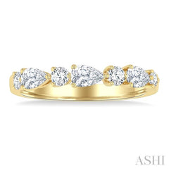 5/8 Ctw Pear and Round Cut Diamond Fashion Band in 14K Yellow Gold