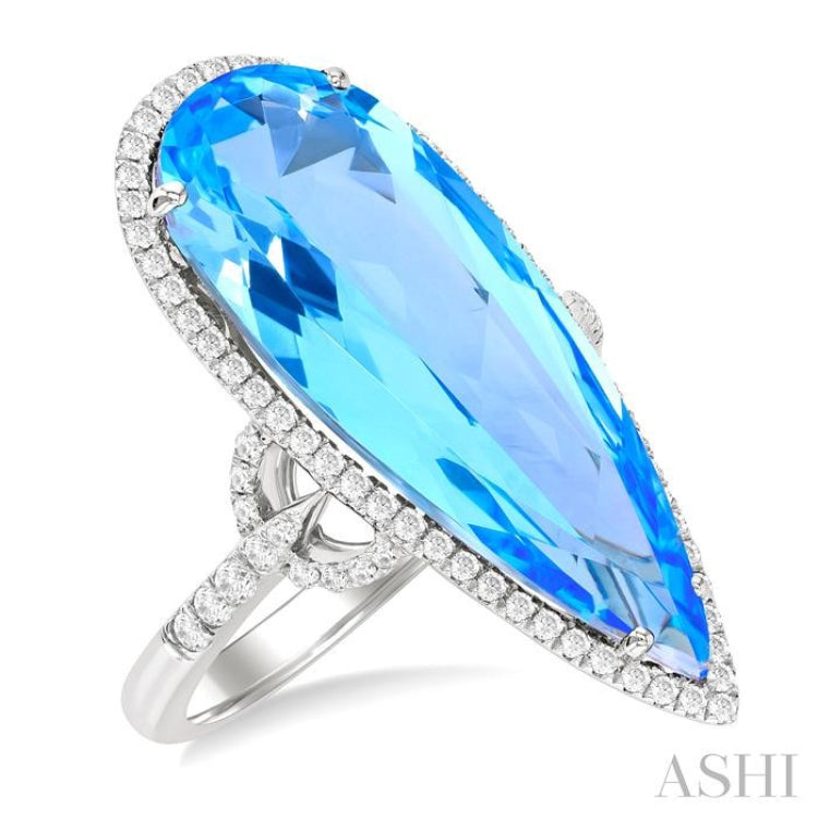 26X10 MM Pear Cut Blue Topaz and 1/2 Ctw Round Cut Diamond Halo Semi-Precious Ring in 14K White Gold