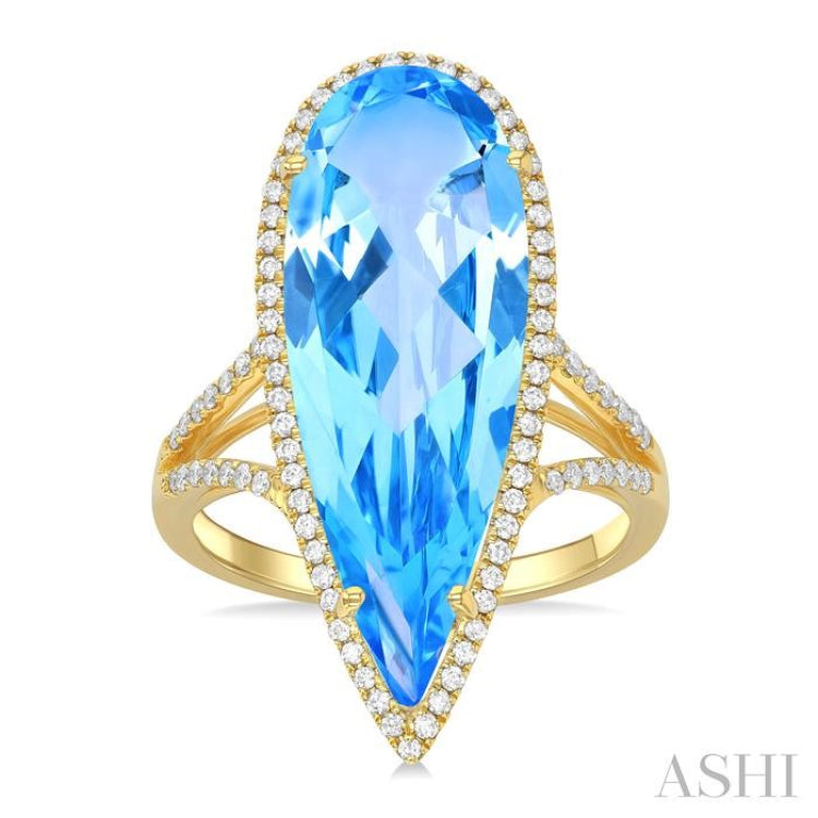 26x9 MM Pear Shape Blue Topaz and 1/3 Ctw Round Cut Diamond Halo Semi-Precious Ring in 14K Yellow Gold