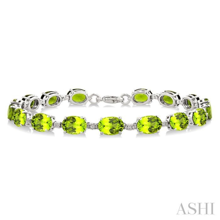 7X5 MM Oval Shape Peridot and 1/10 Ctw Single Cut Diamond Semi-Precious Bracelet in Sterling Silver