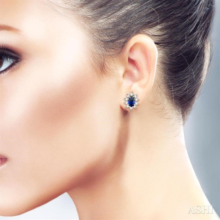 5x3MM Oval Cut Sapphire and 1/4 Ctw Round Cut Diamond Earrings in 14K White Gold