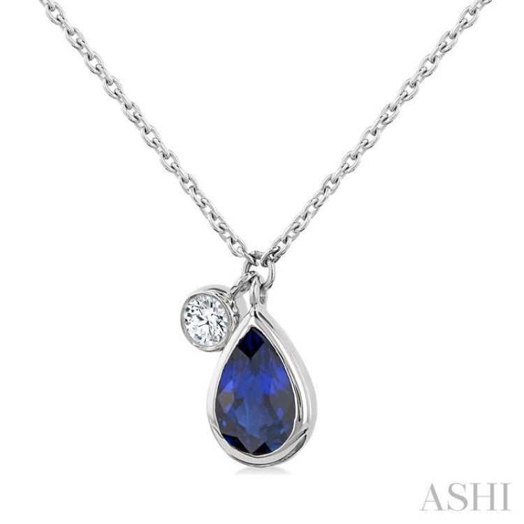 6x4 MM Pear Cut Sapphire and 1/20 Ctw Bezel Set Round Cut Diamond Precious Pendant With Chain in 14K White Gold