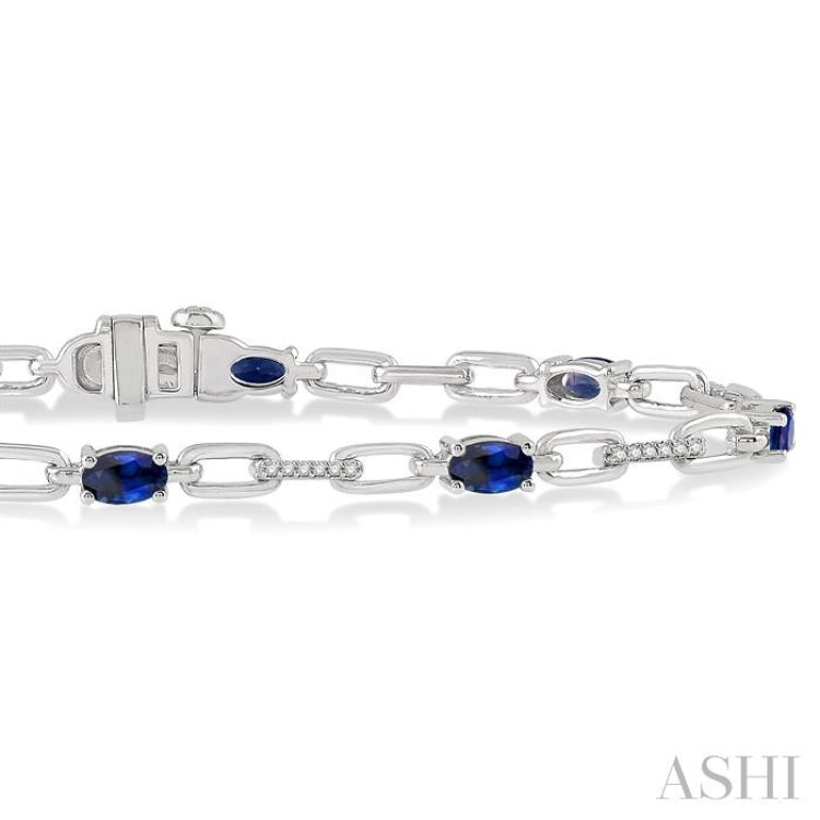 5x3 MM Oval Cut Sapphire and 1/6 Ctw Round Cut Diamond Precious Bracelet in 10K White Gold