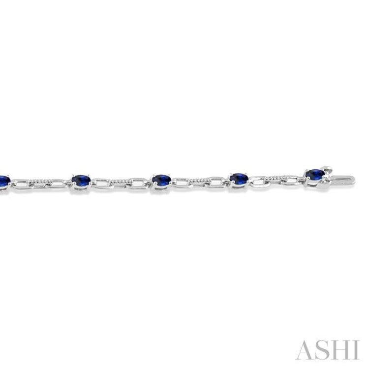 5x3 MM Oval Cut Sapphire and 1/6 Ctw Round Cut Diamond Precious Bracelet in 10K White Gold
