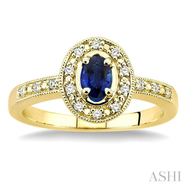 5x3 MM oval cut Sapphire and 1/10 Ctw Single Cut Diamond Ring in 14K Yellow Gold.