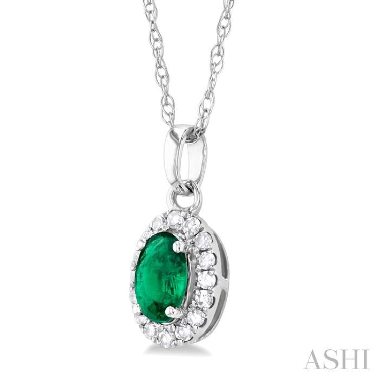 5x3 MM Oval Shape Emerald and 1/20 Ctw Single Cut Diamond Halo Precious Pendant with Chain in 10K White Gold