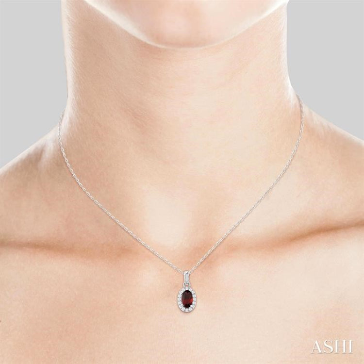 5x3 MM Oval Shape Garnet and 1/20 Ctw Single Cut Diamond Halo Semi-Precious Pendant with Chain in 10K White Gold