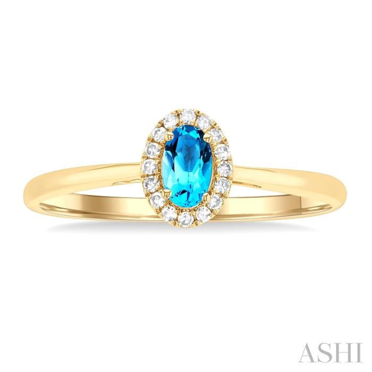 5x3 MM Oval Shape Blue Topaz and 1/20 Ctw Single Cut Diamond Halo Semi-Precious Ring in 14K Yellow Gold