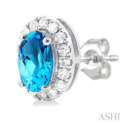 5x3 MM Oval Shape Blue Topaz and 1/8 Ctw Single Cut Diamond Halo Semi-Precious Stud Earrings in 10K White Gold