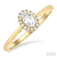 5x3 MM Oval Shape White Topaz and 1/20 Ctw Single Cut Diamond Halo Semi-Precious Ring in 14K Yellow Gold