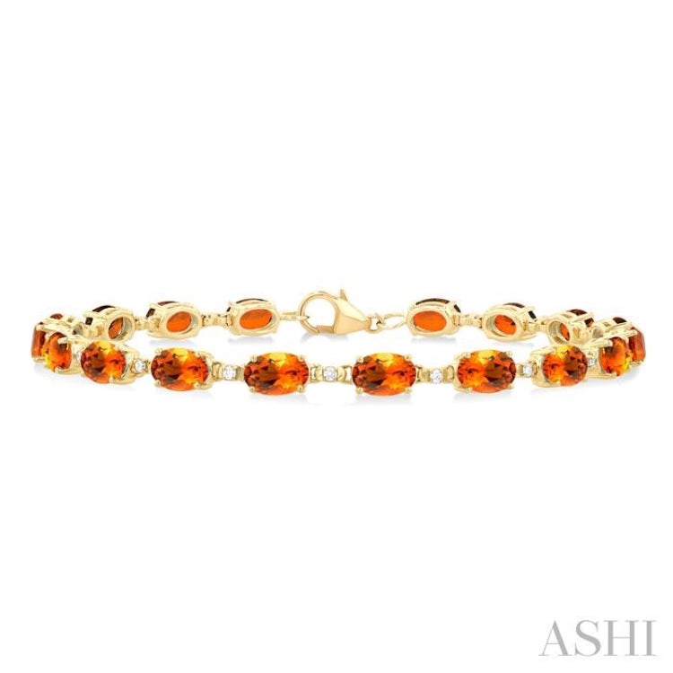 6X4 MM Oval Cut Citrine and 1/6 Ctw Round Cut Diamond Semi-Precious Tennis Bracelet in 10K Yellow Gold