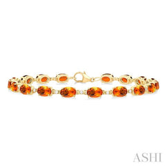 6X4 MM Oval Cut Citrine and 1/6 Ctw Round Cut Diamond Semi-Precious Tennis Bracelet in 10K Yellow Gold
