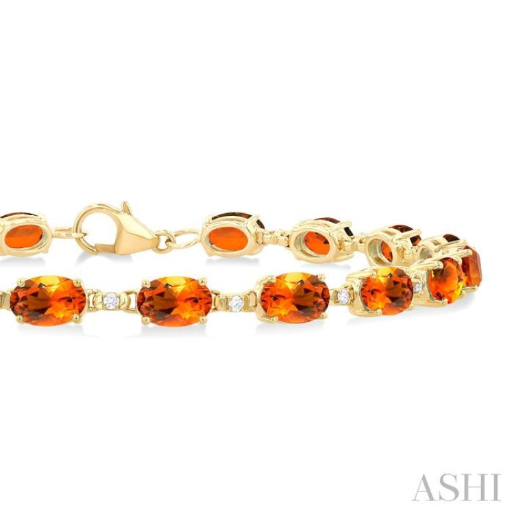 6X4 MM Oval Cut Citrine and 1/6 Ctw Round Cut Diamond Semi-Precious Tennis Bracelet in 10K Yellow Gold