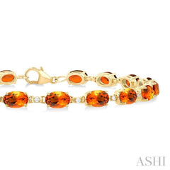 6X4 MM Oval Cut Citrine and 1/6 Ctw Round Cut Diamond Semi-Precious Tennis Bracelet in 10K Yellow Gold