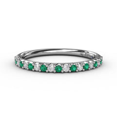 Delicate Emerald Shared Prong Anniversary Band