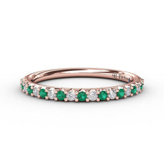 Delicate Emerald Shared Prong Anniversary Band