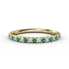 Delicate Emerald Shared Prong Anniversary Band