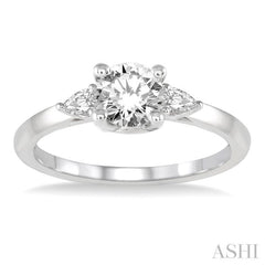 3/4 Ctw Pear and Round Cut Diamond Ladies Engagement Ring With 1/2 Ct Round Cut Center Stone in 14K White Gold