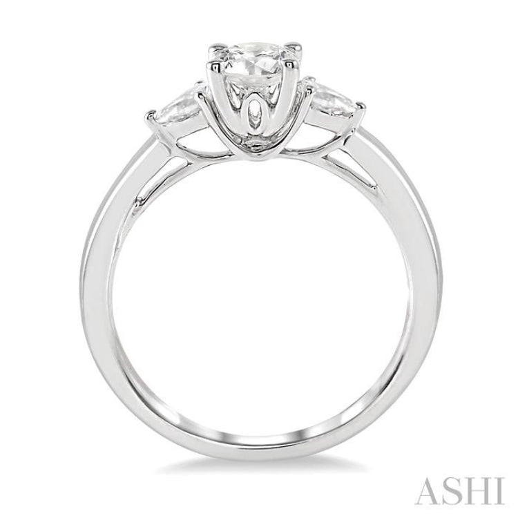 3/4 Ctw Pear and Round Cut Diamond Ladies Engagement Ring With 1/2 Ct Round Cut Center Stone in 14K White Gold