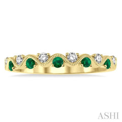 1.8 MM Emerald and 1/6 Ctw Round Cut Diamond Precious Waves Wedding Band in 14K Yellow Gold