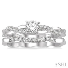 1/2 Ctw Diamond Wedding Set With 1/3 Ct Round Center Diamond Twisted Engagement Ring and 1/10 Ct Wedding Band in 14K White Gold
