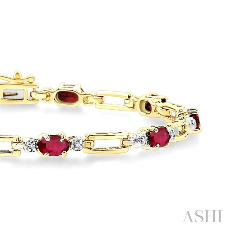 5x3 MM Oval Cut Ruby and 1/10 Ctw Round Cut Diamond Precious Bracelet in 10K Yellow Gold
