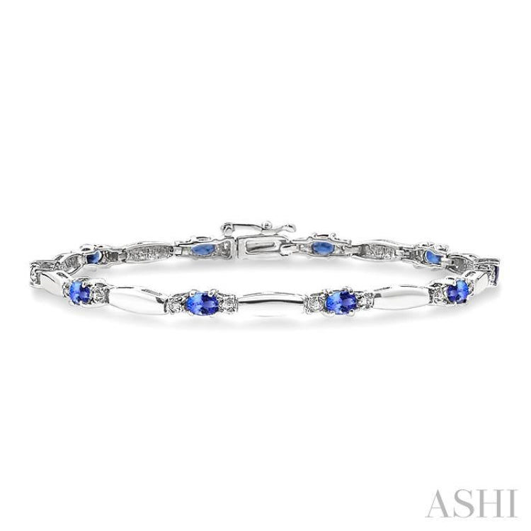 5x3 MM Oval Cut Tanzanite and 1/10 Ctw Bar and Oval Mount Round Cut Diamond Precious Bracelet in 10K White Gold