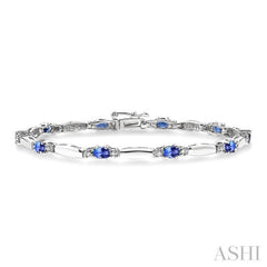 5x3 MM Oval Cut Tanzanite and 1/10 Ctw Bar and Oval Mount Round Cut Diamond Precious Bracelet in 10K White Gold