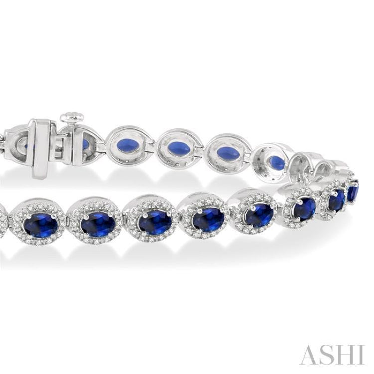 4x3 MM Oval Cut Sapphire and 1 Ctw Round Cut Diamond Precious Bracelet in 14K White Gold