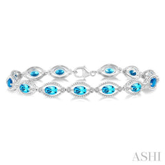 6x4 MM Oval Cut Blue Topaz and 1/10 Ctw Round Cut Diamond Semi-Precious Bracelet in Sterling Silver