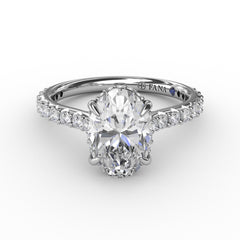 Classic Oval Diamond Solitaire Engagement Ring With Hidden PavÃ© Halo