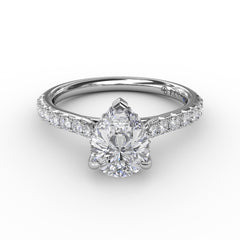 Classic Pear Shape Engagement Ring with a Subtle Diamond Splash