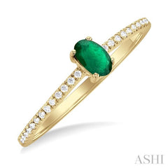5x3 MM Oval Cut Emerald and 1/10 Ctw Petite Round Cut Diamond Precious Fashion Ring in 10K Yellow Gold