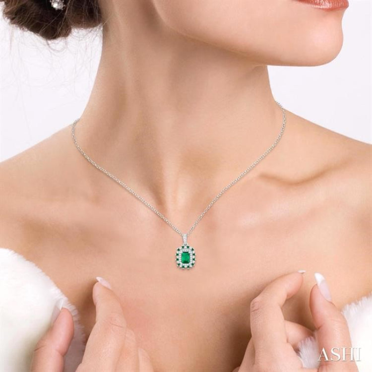 6X4 MM Emerald Cut & 1.55 MM Round Cut Emerald and 1/5 Ctw Round Cut Diamond Floral Precious Pendant With Chain in 14K White Gold