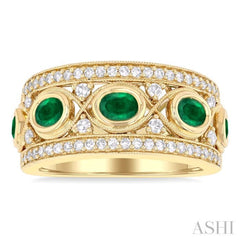 4x3 MM Oval and 2.8 MM Round Cut Emerald and 3/8 Ctw Curvy Criss Cross Single Cut Diamond Precious Band in 14K Yellow Gold