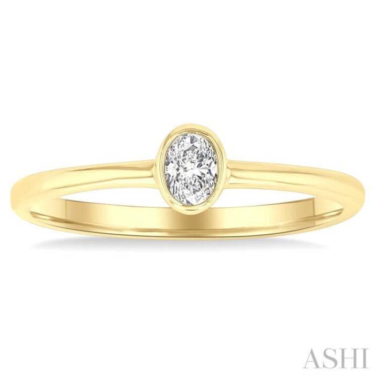 1/6 Ctw Petite Bezel Set Oval Cut Diamond Fashion Ring in 10K Yellow Gold