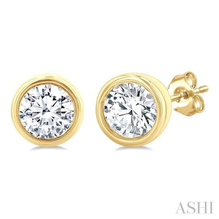 1/5 Ctw Petite Bezel Set Round Cut Diamond Fashion Stud Earring in 10K Yellow Gold