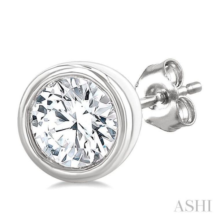 1/5 Ctw Petite Bezel Set Round Cut Diamond Fashion Stud Earring in 10K White Gold