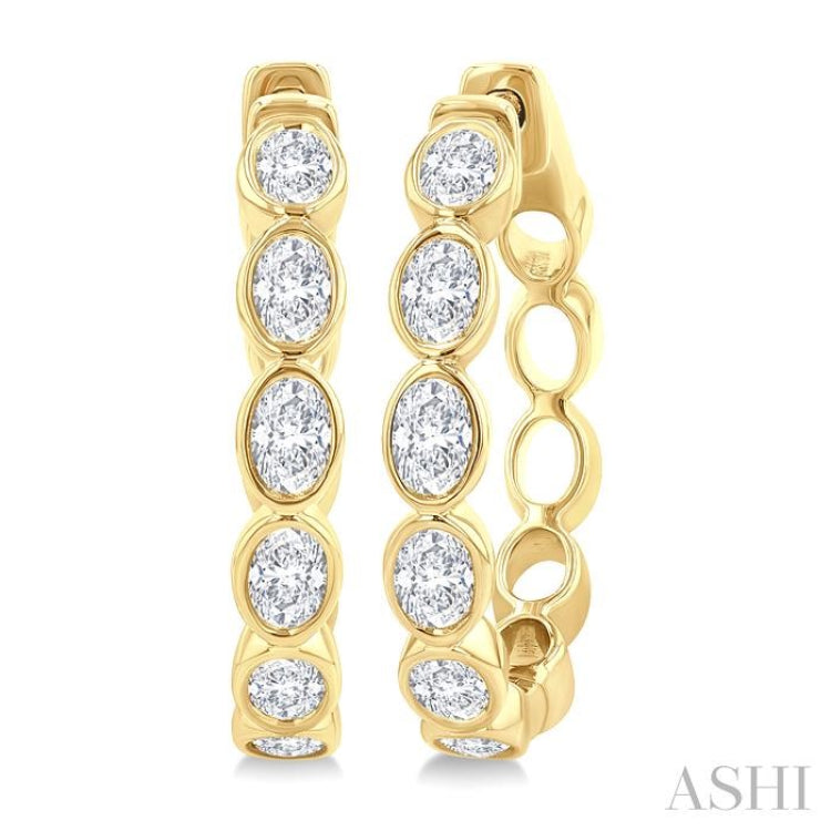 1 1/10 Ctw Bezel Set Oval Cut Diamond Fashion Hoop Earring in 14K Yellow Gold