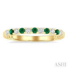 1.75 MM Emerald and 1/6 Ctw Round Cut Diamond Precious Wedding Band in 14K Yellow Gold