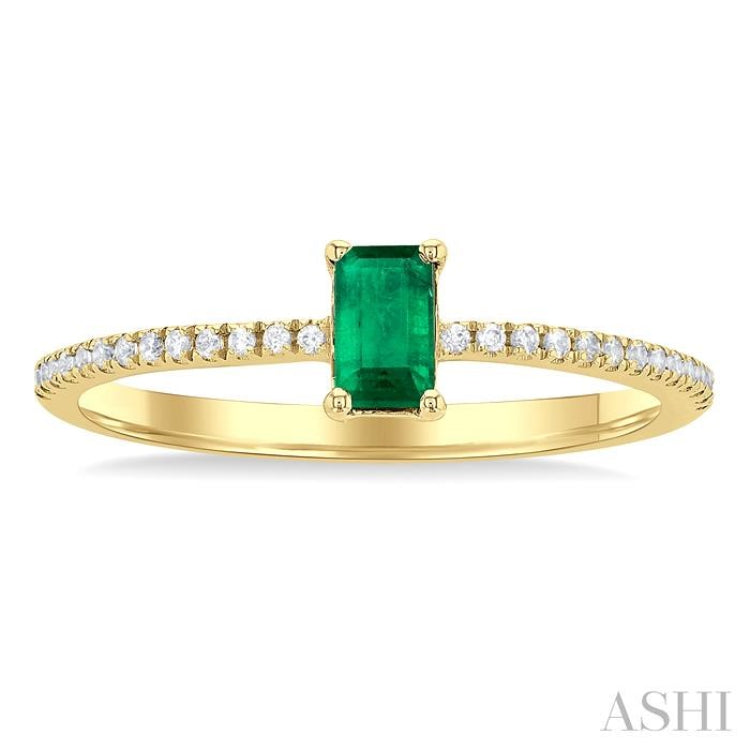 5x3 MM Emerald Shape Emerald and 1/10 Ctw Petite Round Cut Diamond Precious Fashion Ring in 10K Yellow Gold