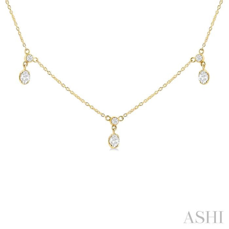 5/8 Ctw Dangle Oval and Round Cut Diamond Station Necklace in 14K Yellow Gold