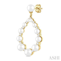2 MM-4.5 MM Tear Drop Cultured Pearls and 1/4 Ctw Round Cut Diamond Fashion Earring in 10K Yellow Gold